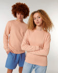 Le sweatshirt iconique à col rond unisexe en coton bio